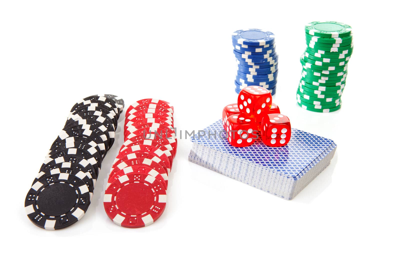 colorful casino chips, carts and dices over white background
