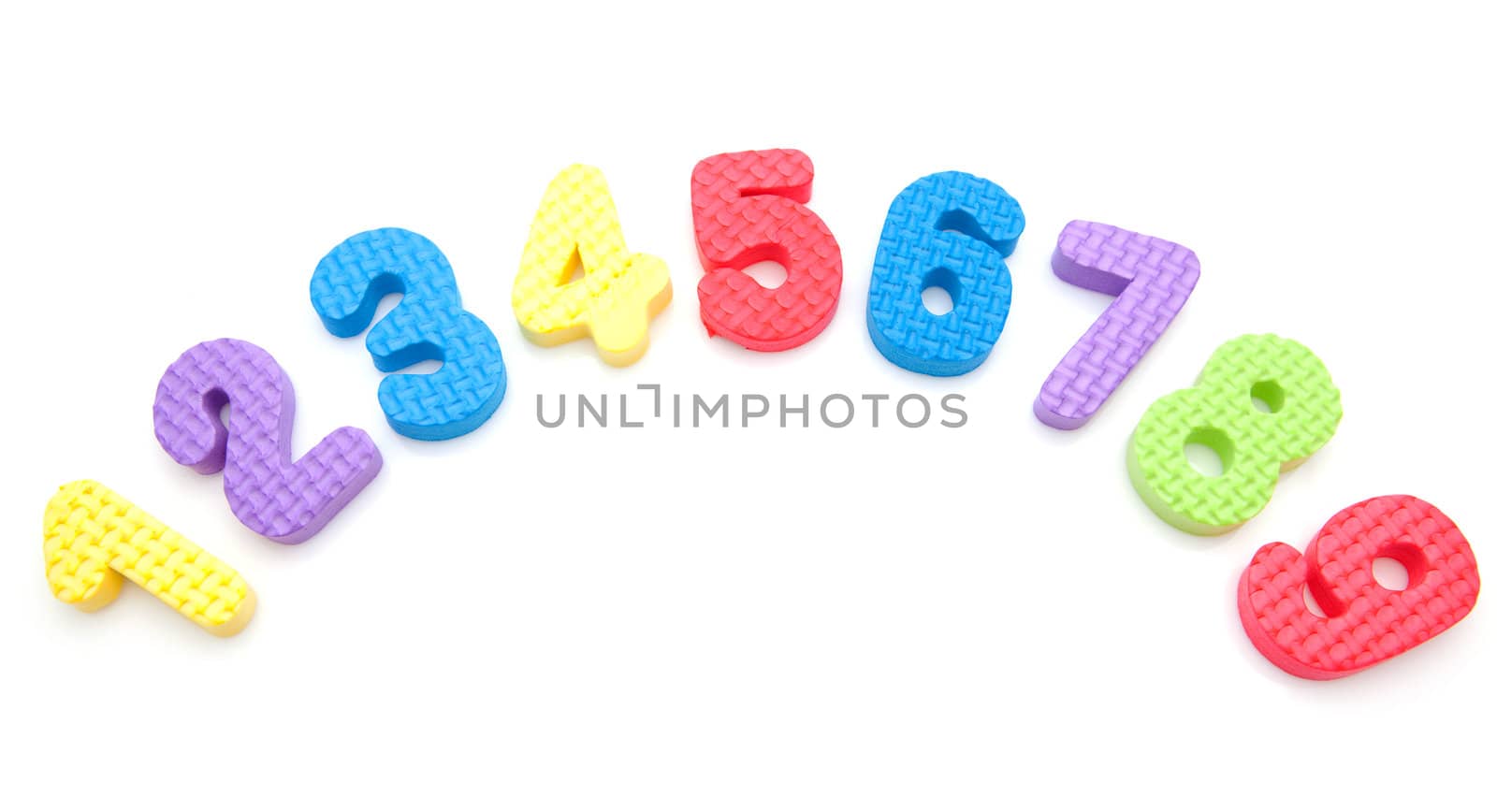 colorful foam figures one to nine over white background