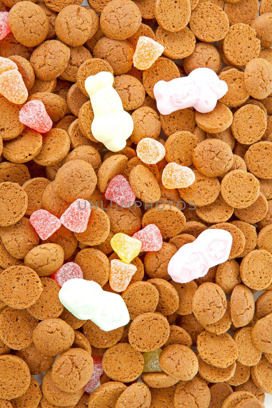 background of typical dutch sweets: pepernoten (ginger nuts) for a celebration at 5 december in the Netherlands