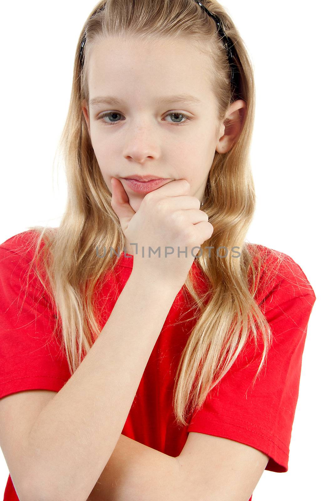 portrait of thinking young girl over white background