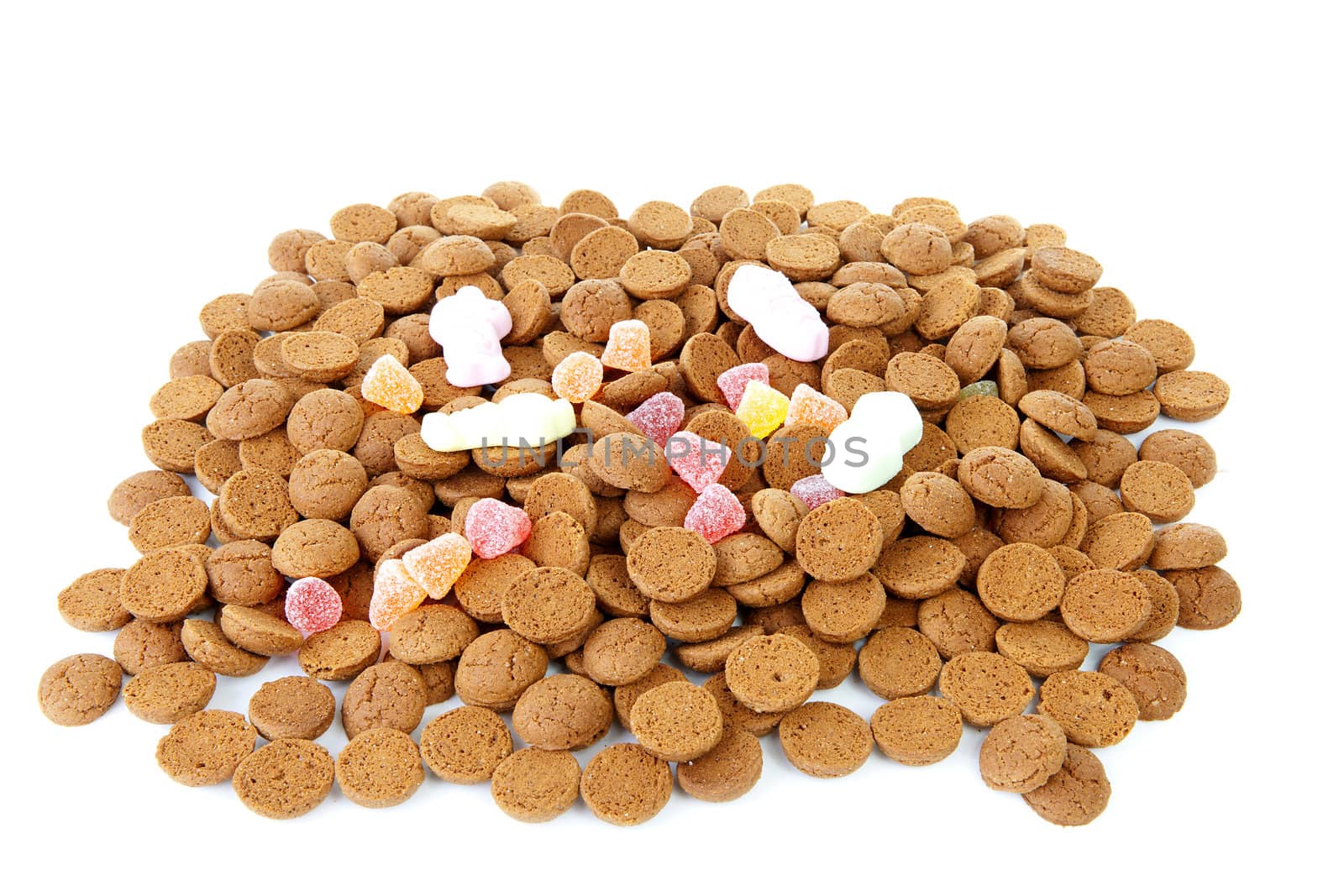 Pile of typical dutch sweets: pepernoten (ginger nuts) for a celebration at 5 december in the Netherlands 
