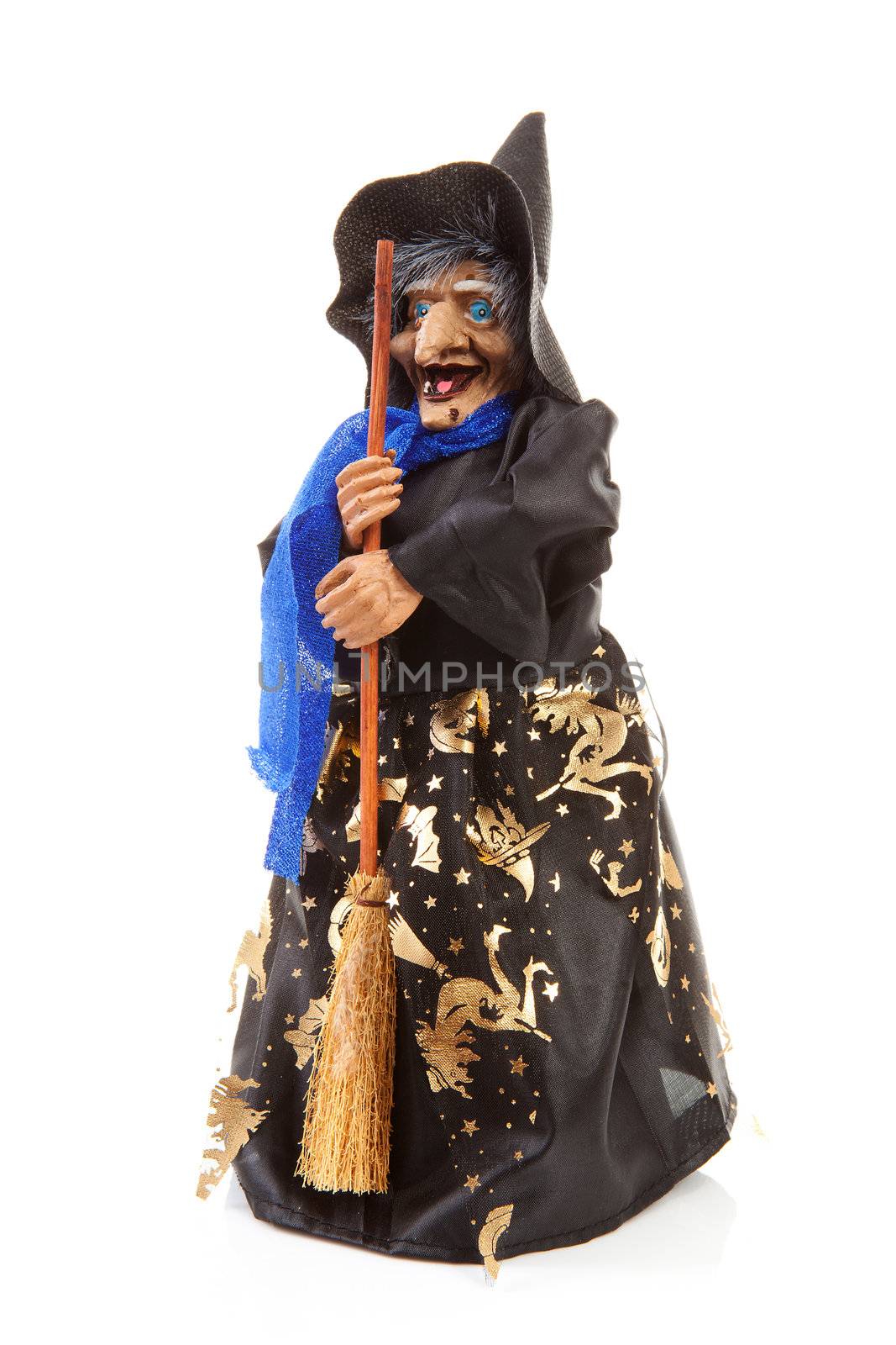 Witch doll for Halloween over white background