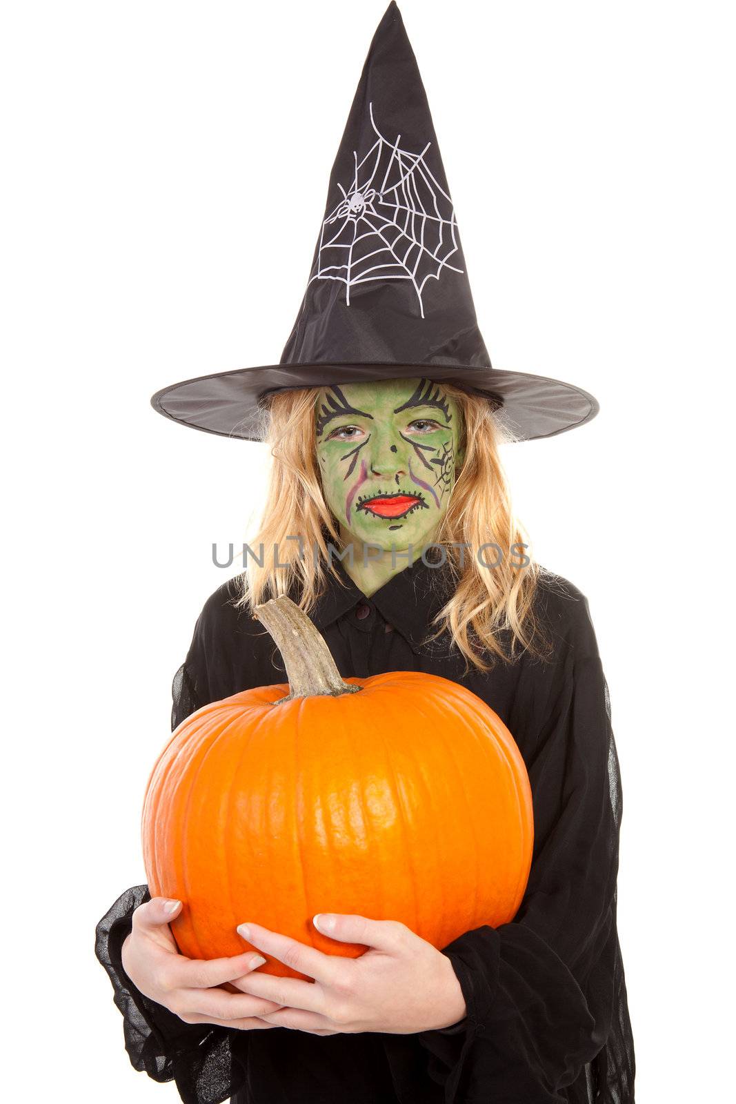green witch for halloween holding pumpkin over white background