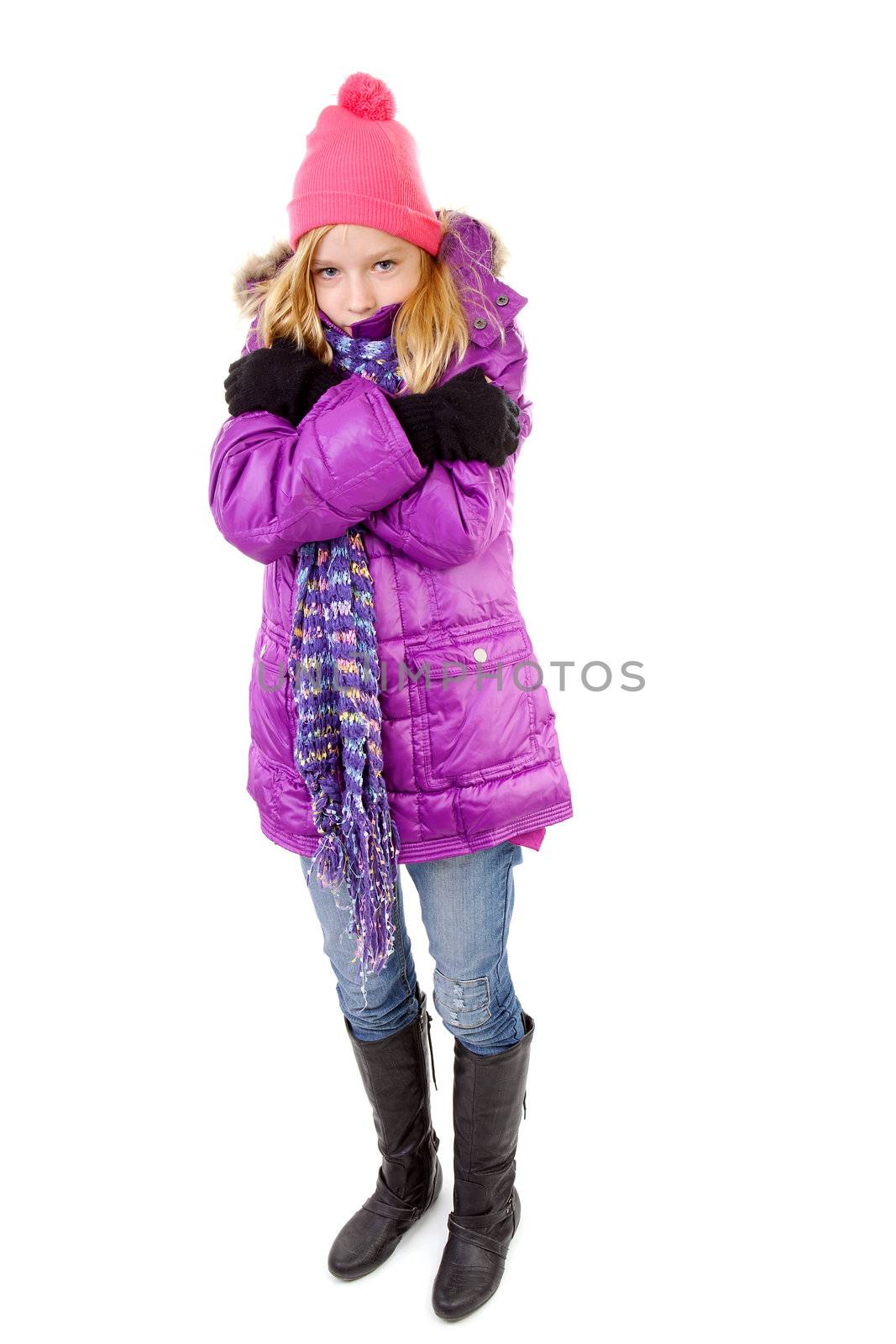 young girl in winter outfit heaving cold over white background