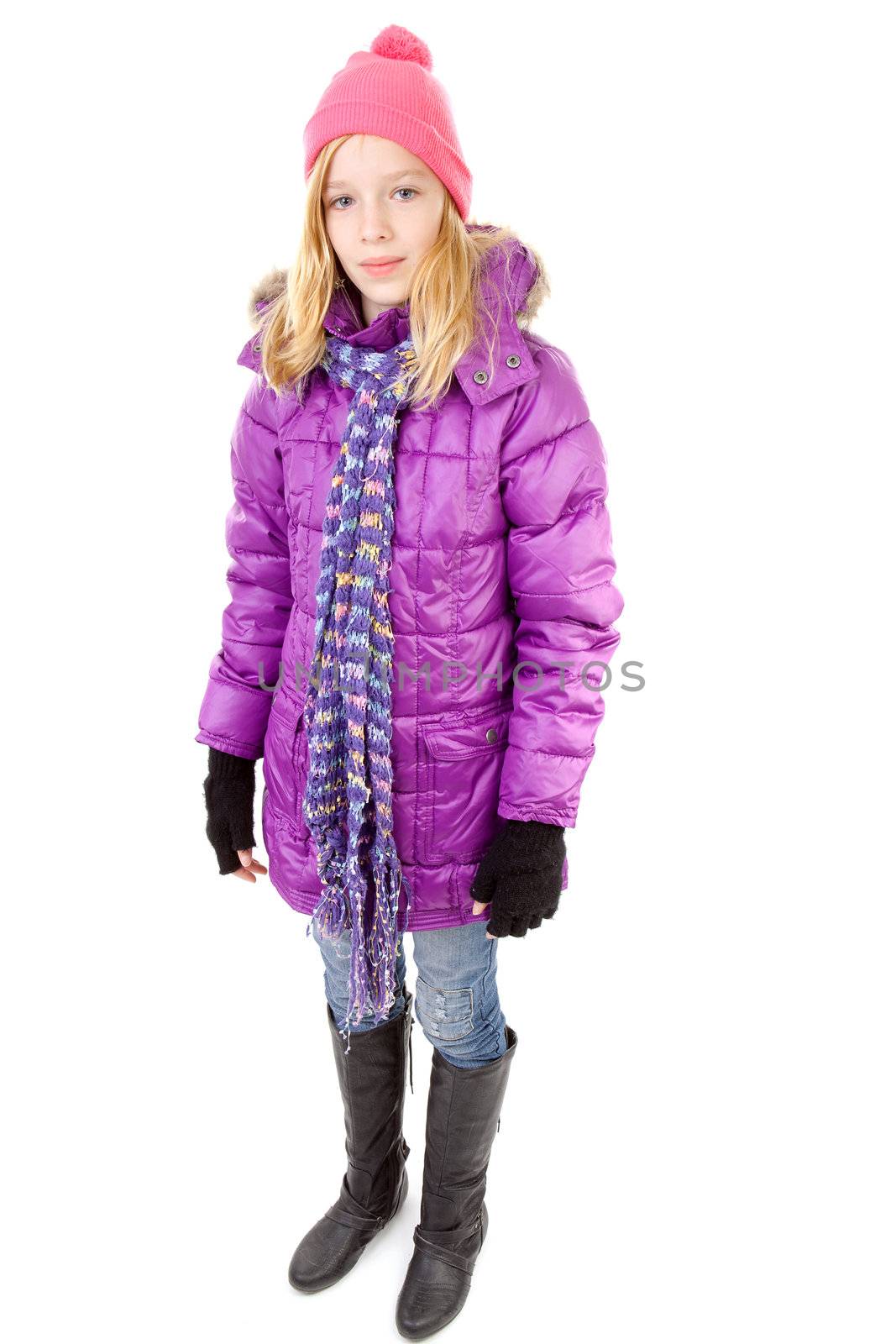 young girl in winter outfit over white background