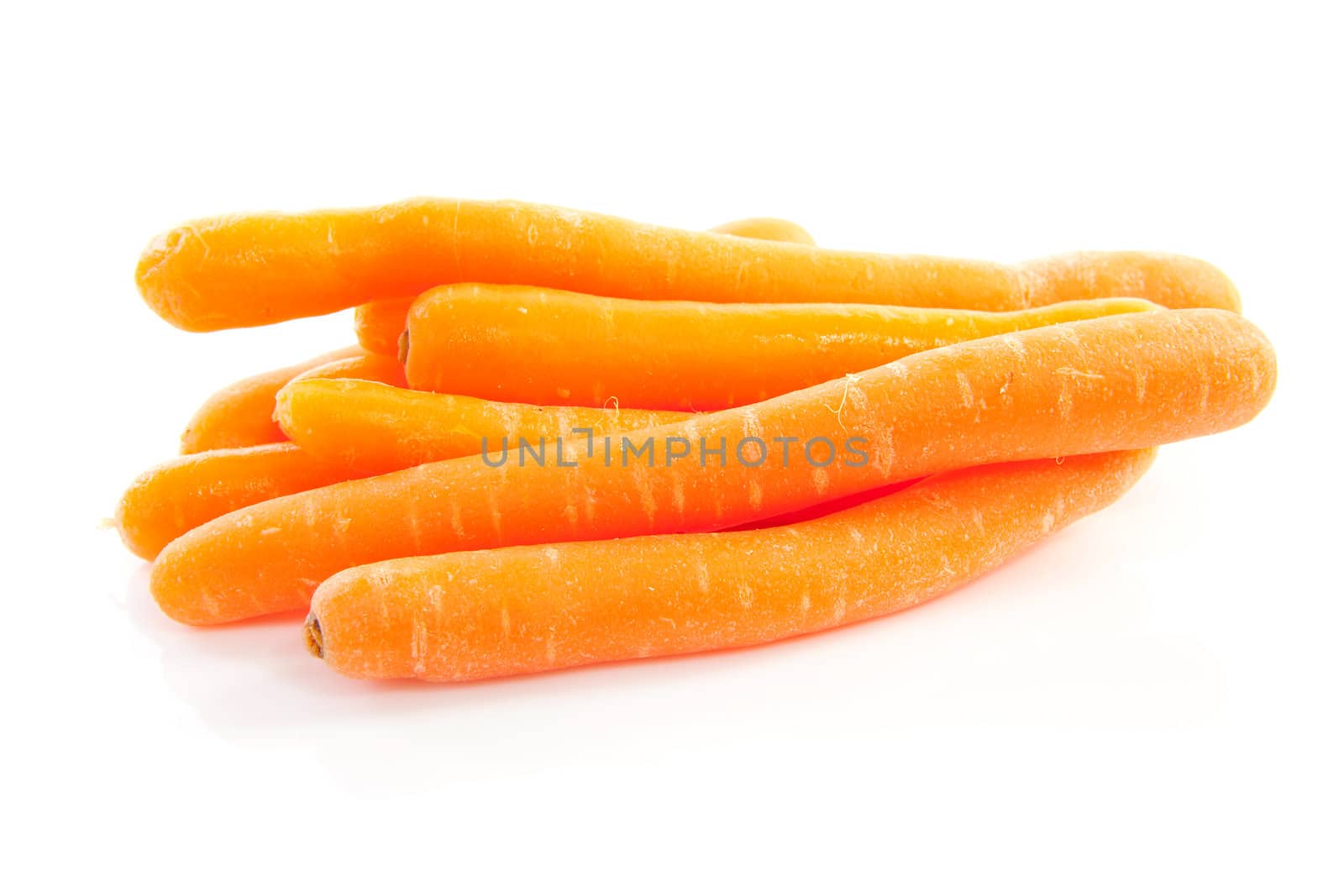 Pile of fresh carrots isolated on white background