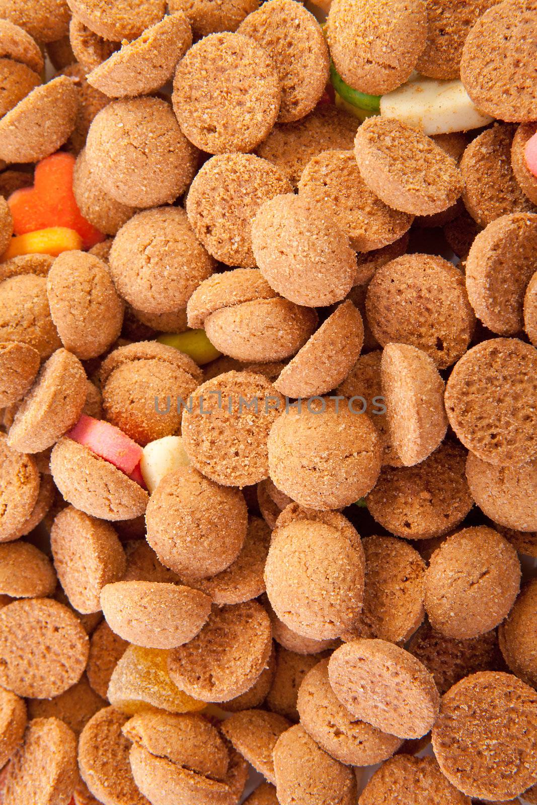 background of typical dutch sweets: pepernoten (ginger nuts) for a celebration at 5 december in the Netherlands