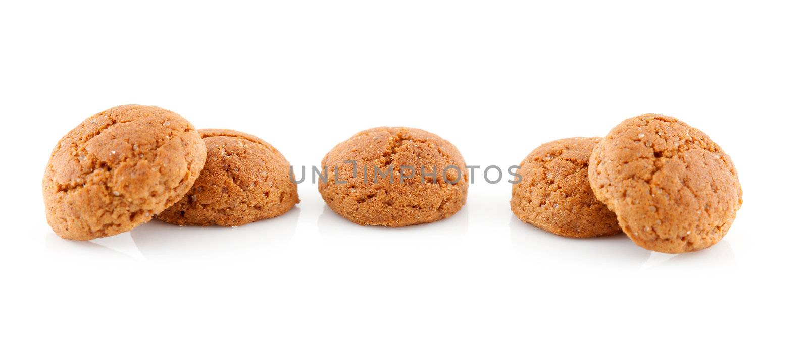 Couple of  pepernoten (ginger nuts) sweets for typical Dutch festivity at 5 december over white background