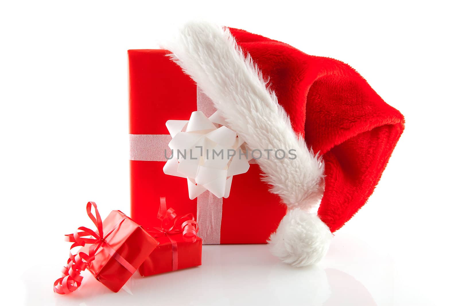 christmas presents and hat isolated on white background