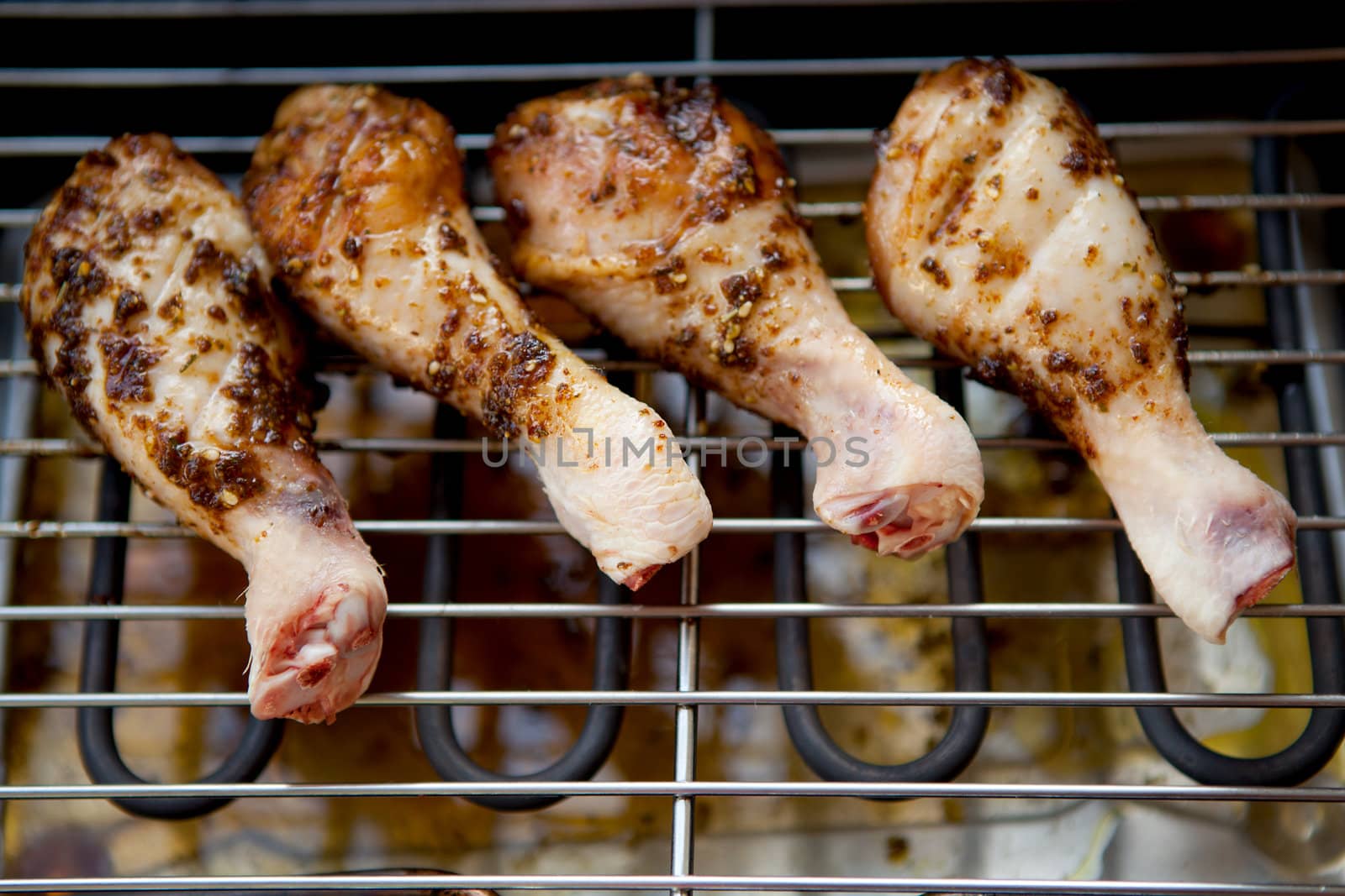 chicken meat on the barbecue in closeup
