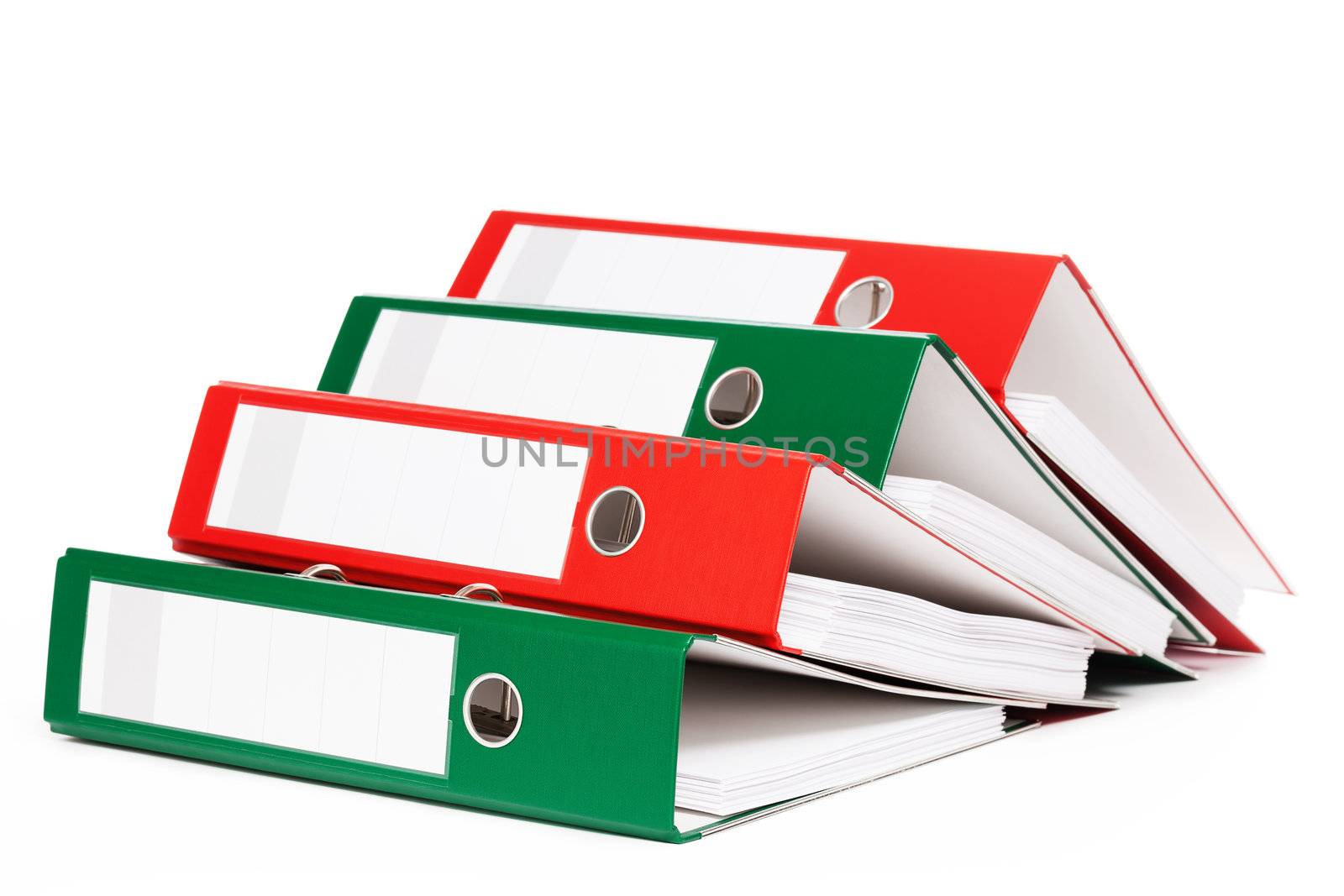 lying red and green ring binders on white background