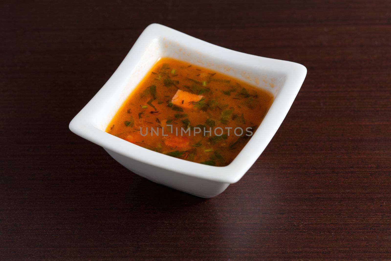 Chicken Soup on wooden table by sfinks