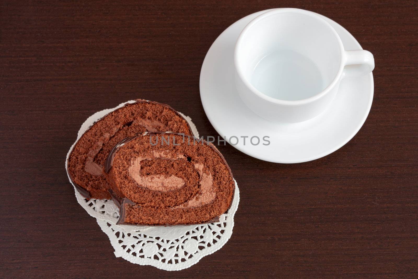 Chocolate sacher cake on wooden table