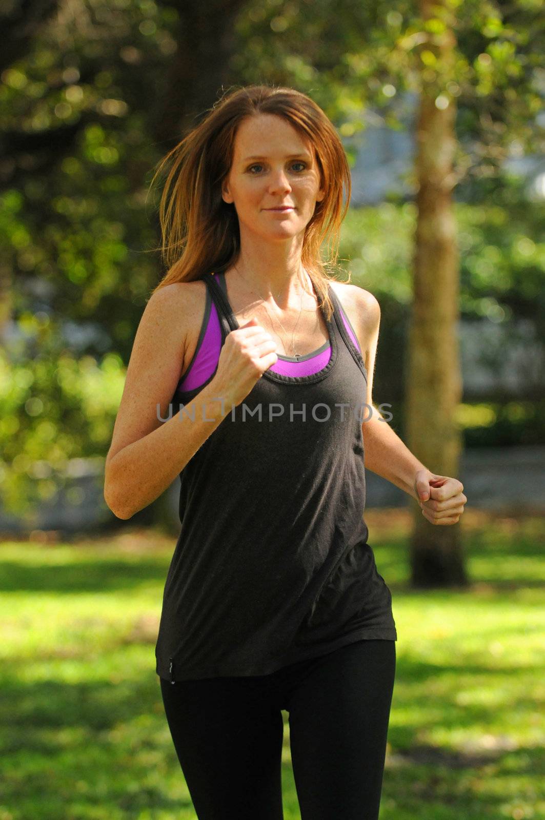 young woman getting in shape by running by ftlaudgirl