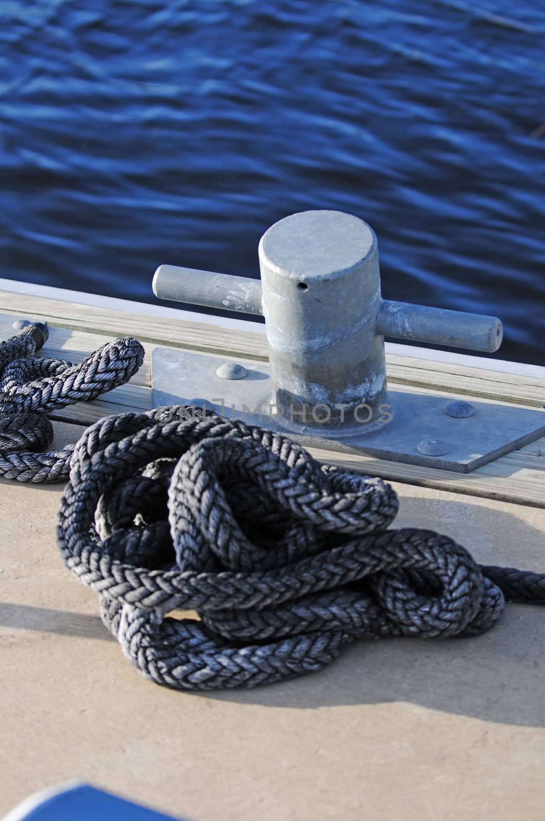 dock with cleat and rope for boating