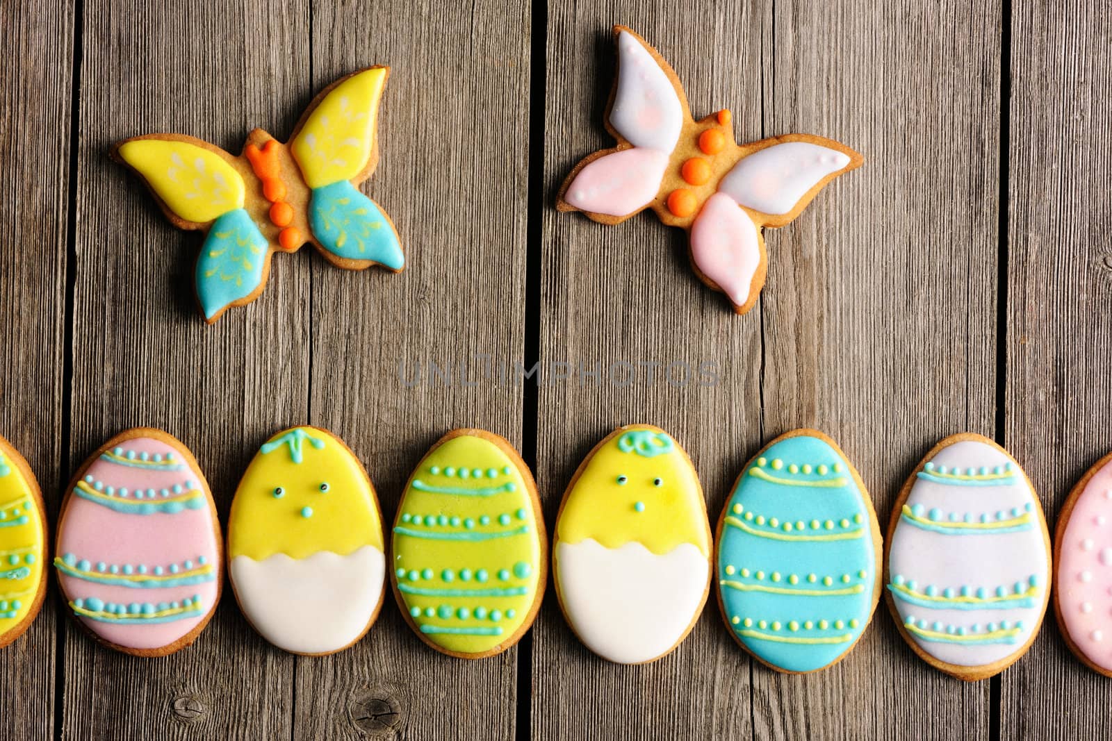 Easter homemade gingerbread cookie over wooden table