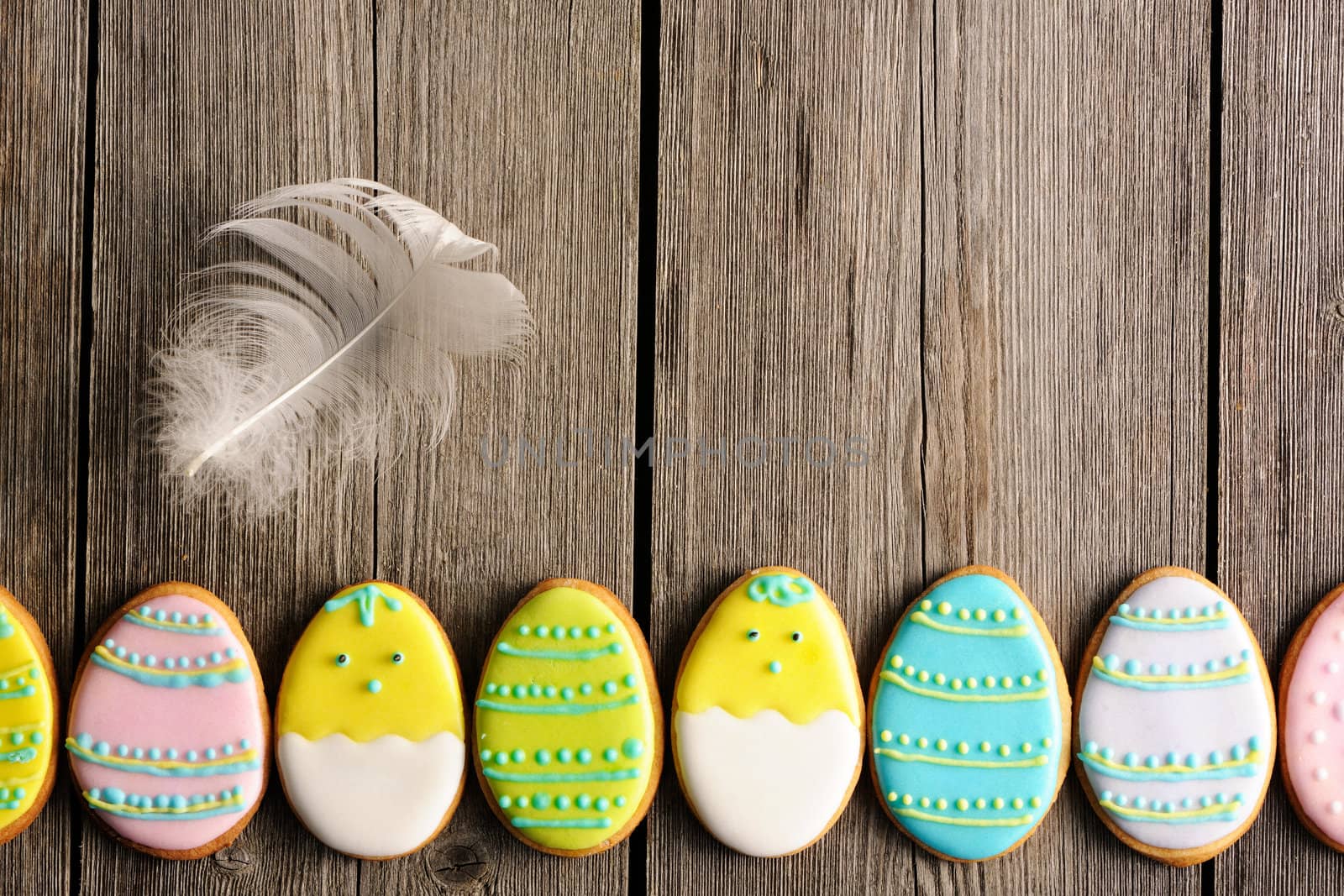Easter homemade gingerbread cookie over wooden table