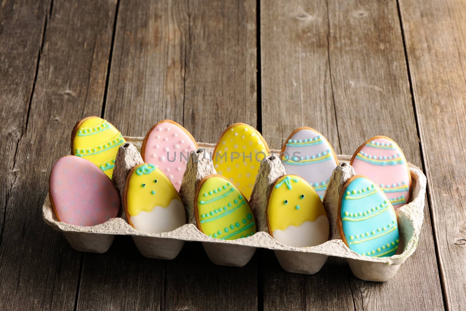 Easter homemade gingerbread cookie over wooden table