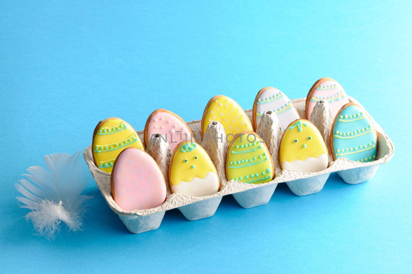 Easter homemade gingerbread cookie over blue