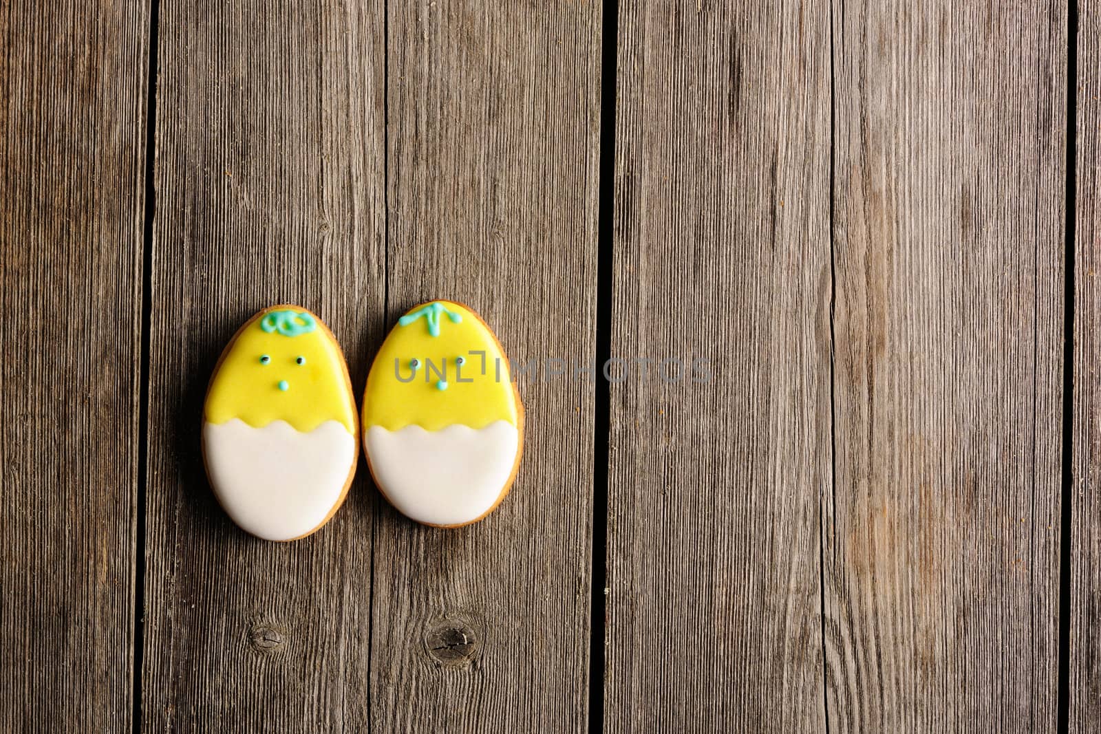 Easter homemade gingerbread cookie over wooden table