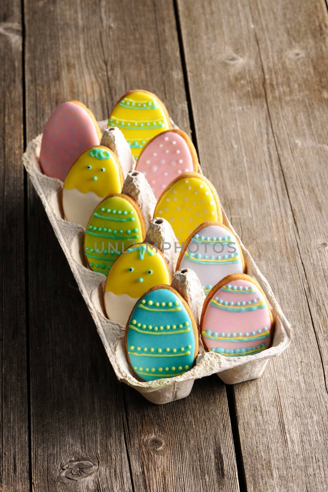 Easter homemade gingerbread cookie over wooden table