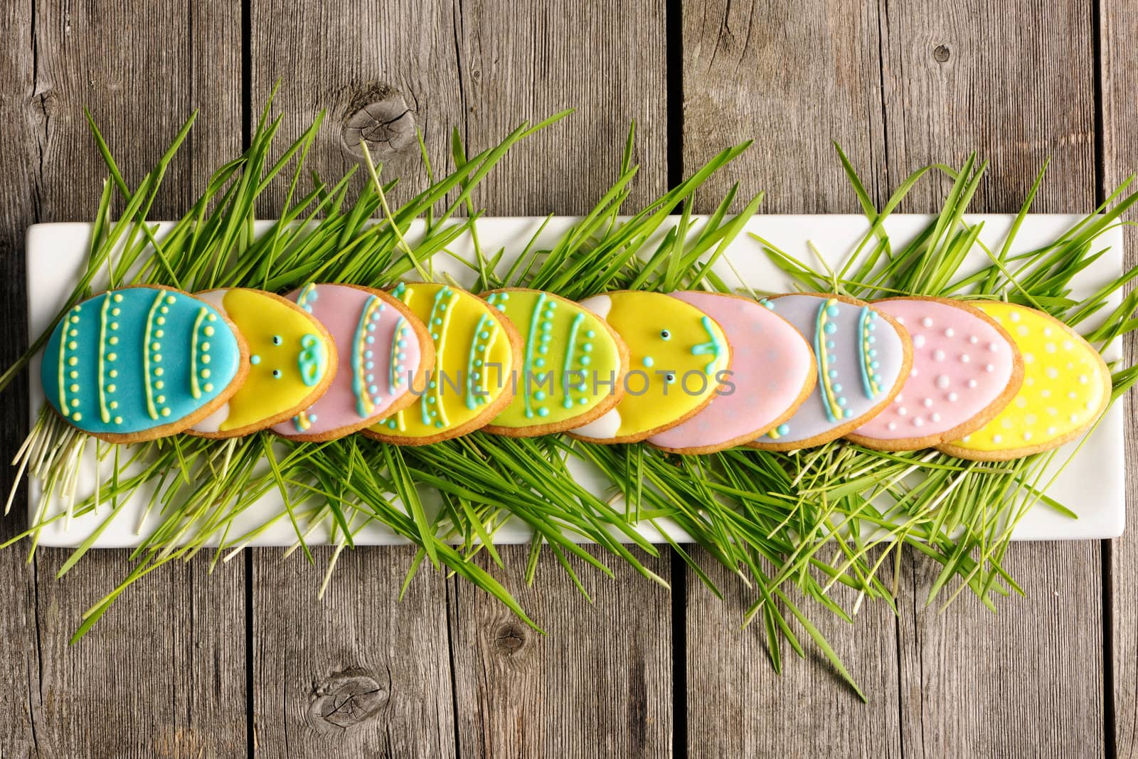 Easter homemade gingerbread cookie over wooden table