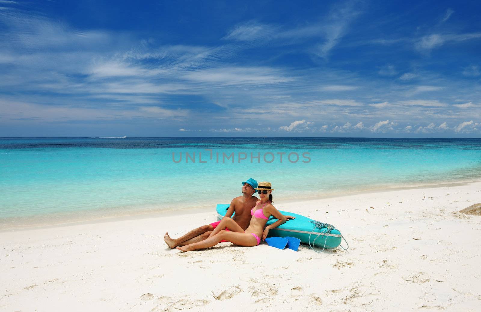 Couple on a beach by haveseen