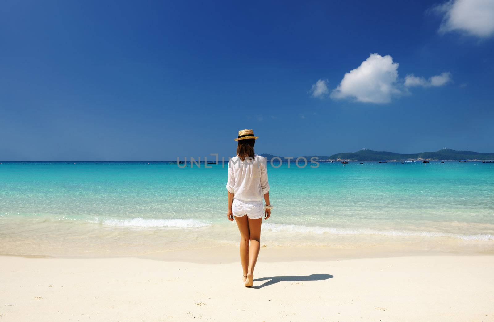 Woman at beach by haveseen