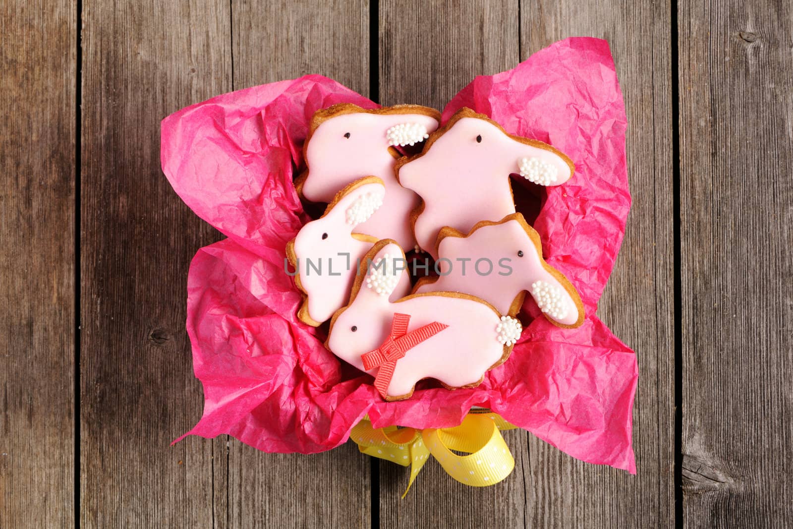 Easter homemade gingerbread cookie over wooden table