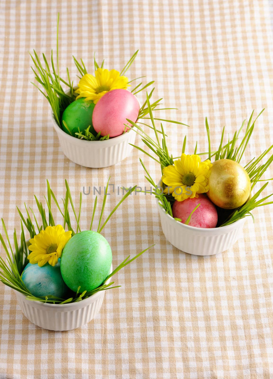 Colored easter eggs on tablecloth