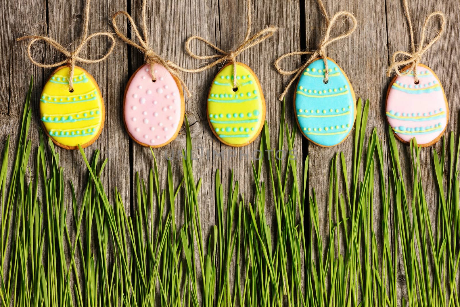 Easter homemade gingerbread cookie over wooden table