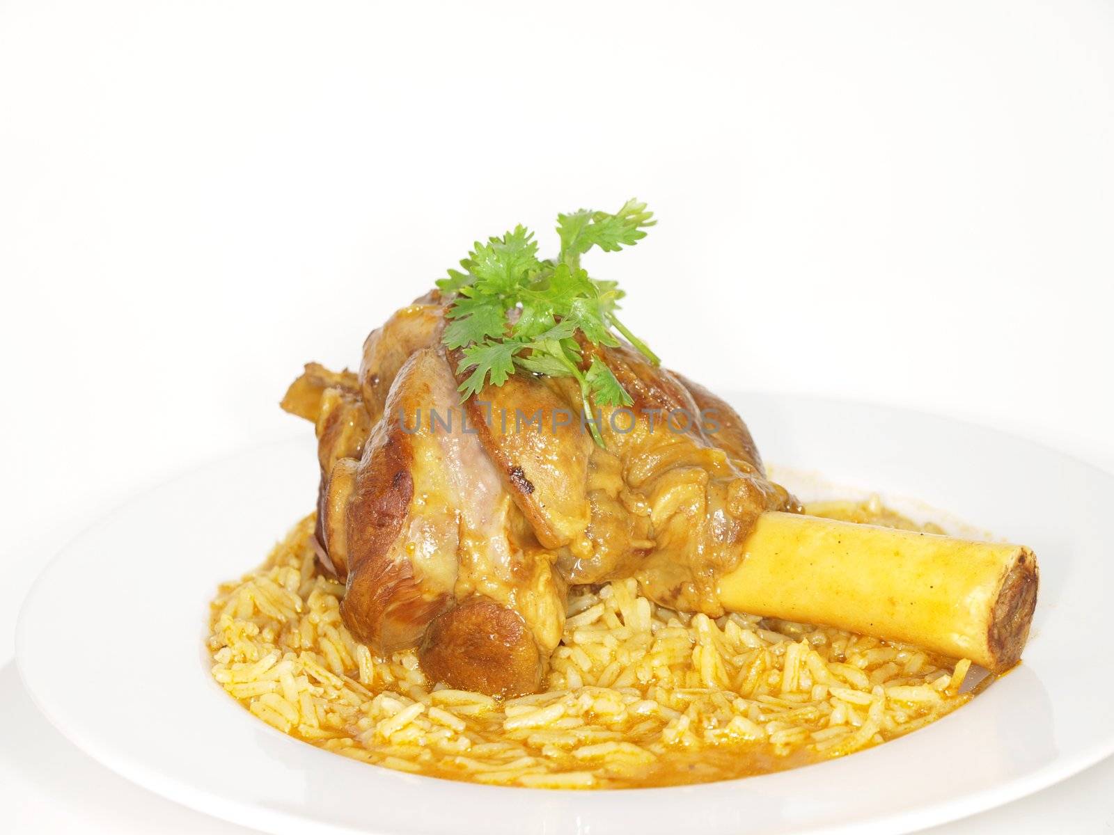 Lamb shank in juicy yellow rice by Arvebettum