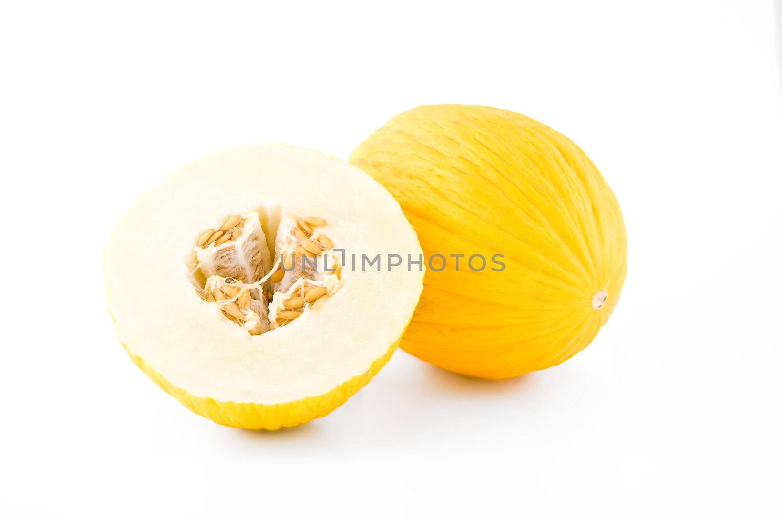Fresh yellow melon slices isolated on white background, fruit