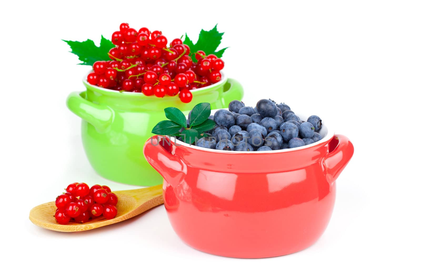 delicious red currant and blueberry, isolated on white background
