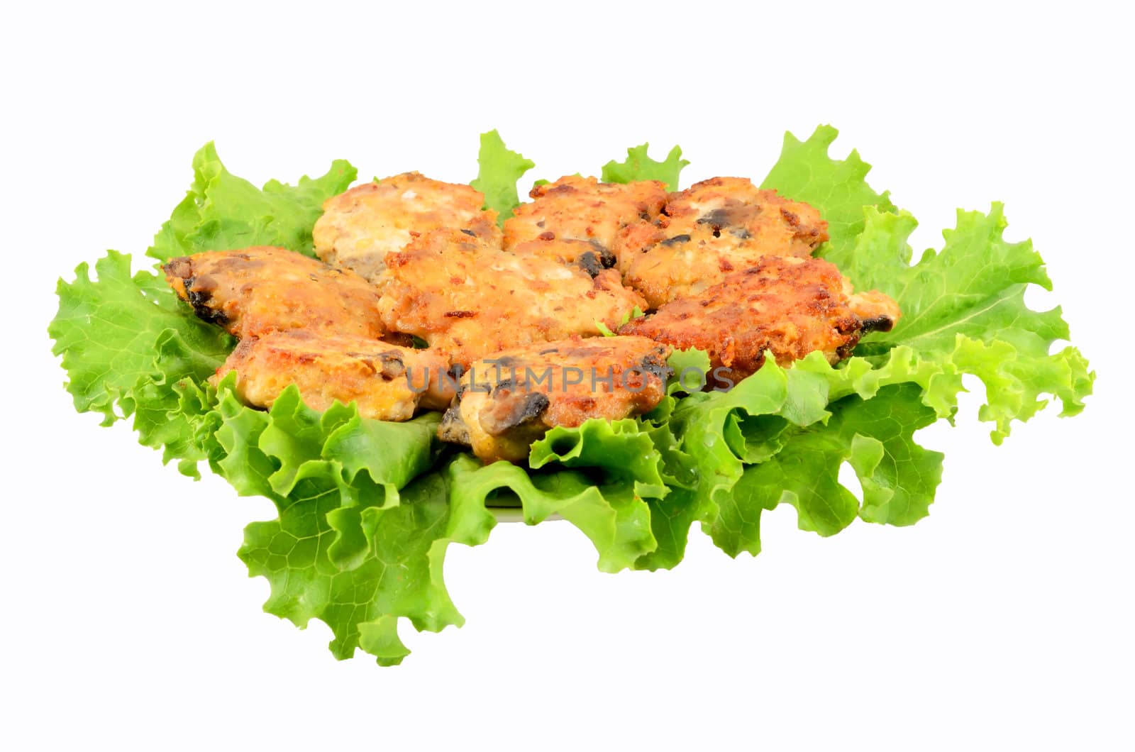 Cutlets minced on leaves of salad