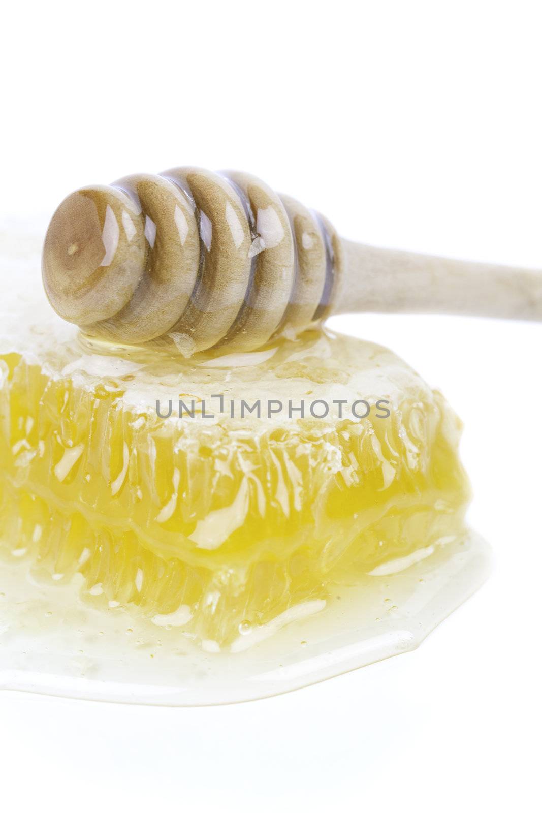 healthy organic honeycomb isolated on white background
 by motorolka