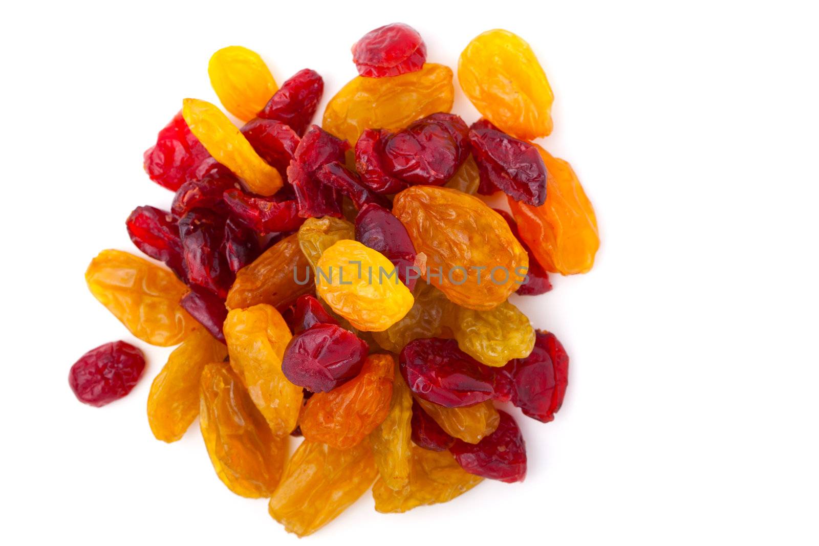Golden and red raisins, on white background