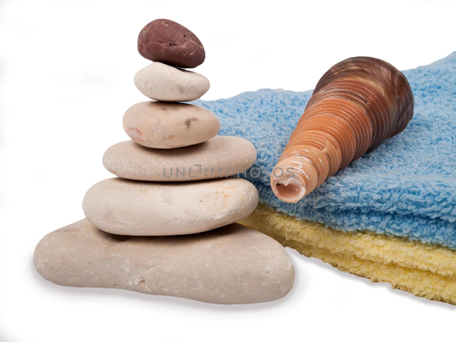 sea stones, towels and sea shell