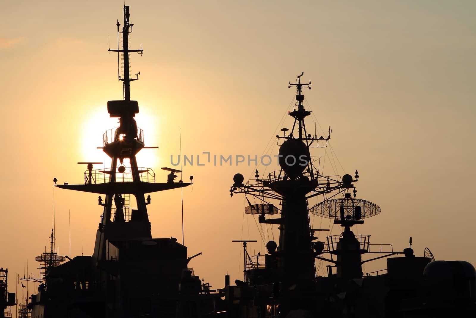 battleship with sunset behind