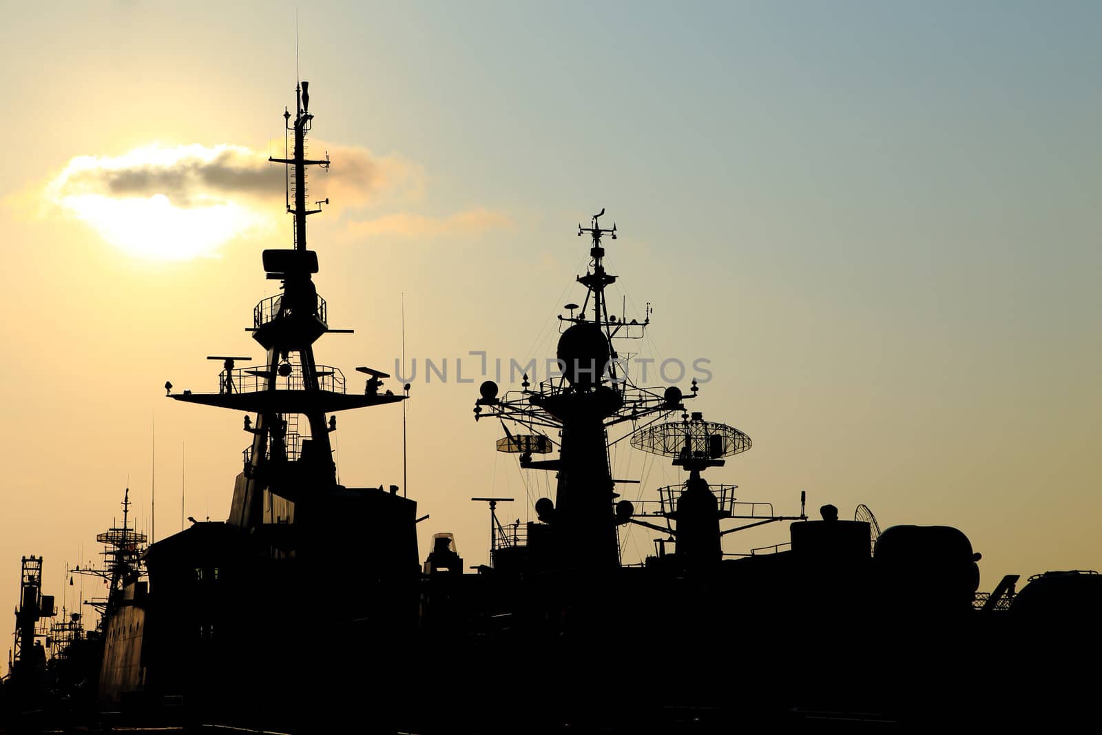 battleship with sunset behind