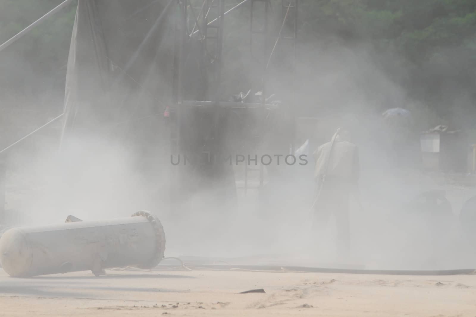 Sandblasting of metal structures at construction site