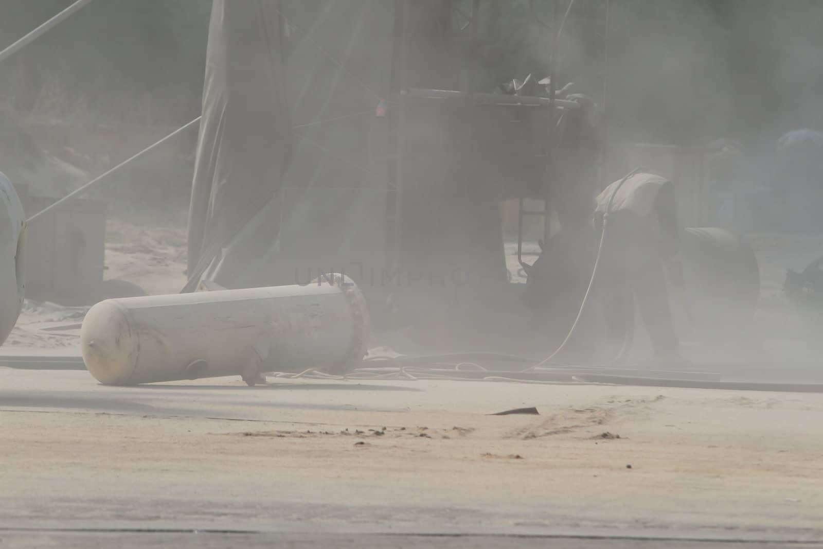 Sandblasting of metal structures at construction site