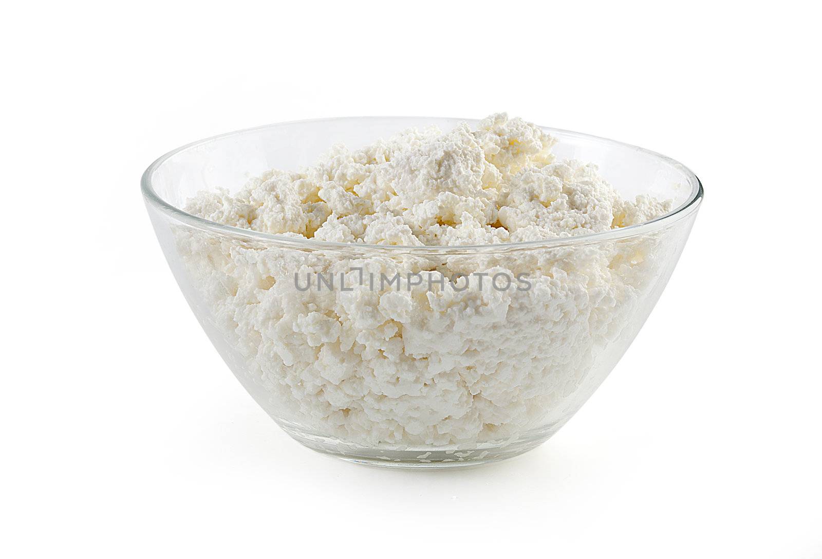 some cottage cheese in the glass bowl