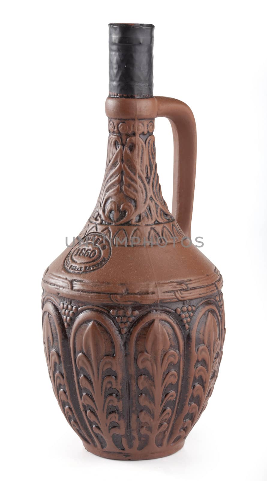 Isolated clay jug for wine on the white background