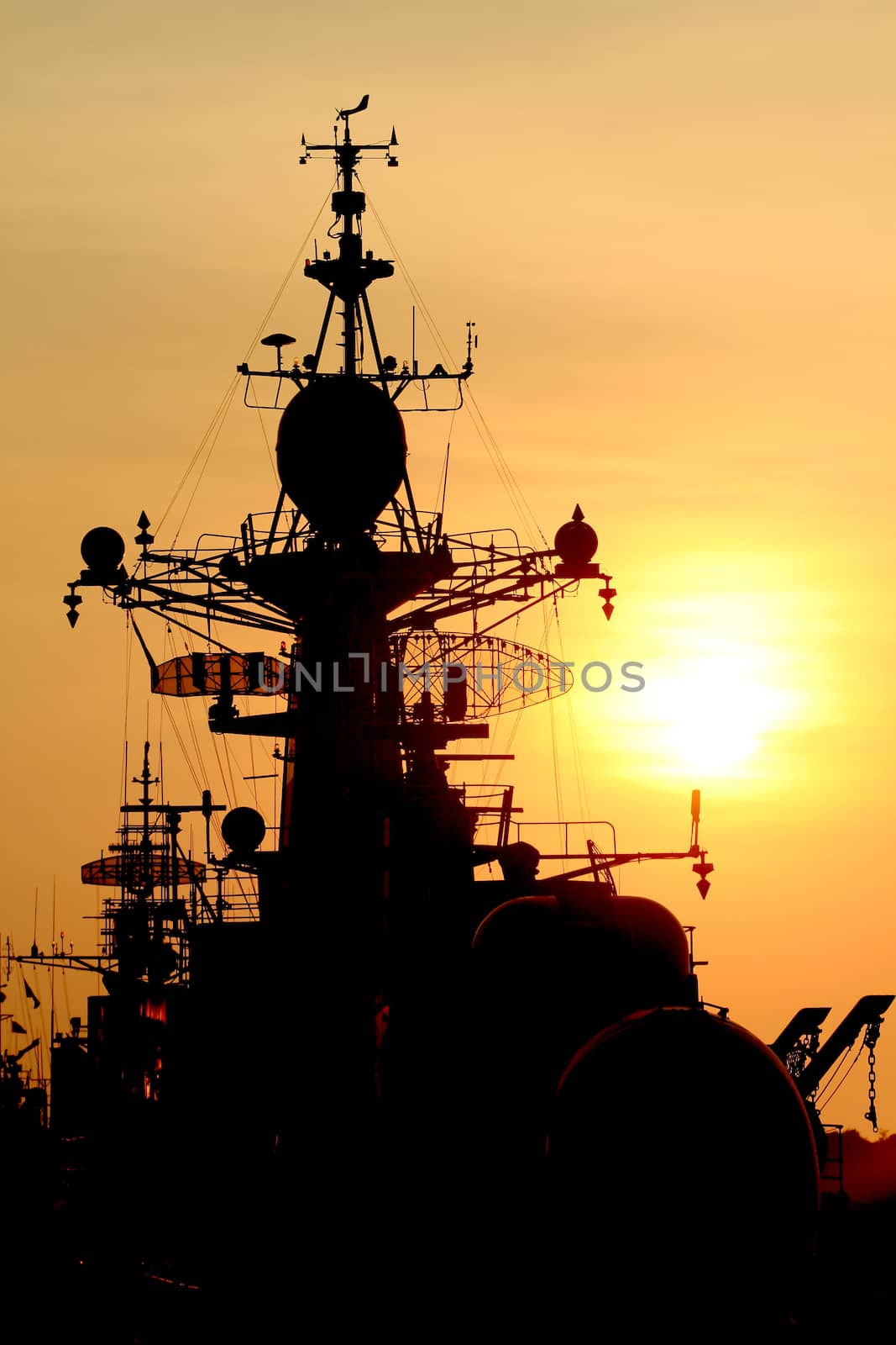 battleship with sunset behind