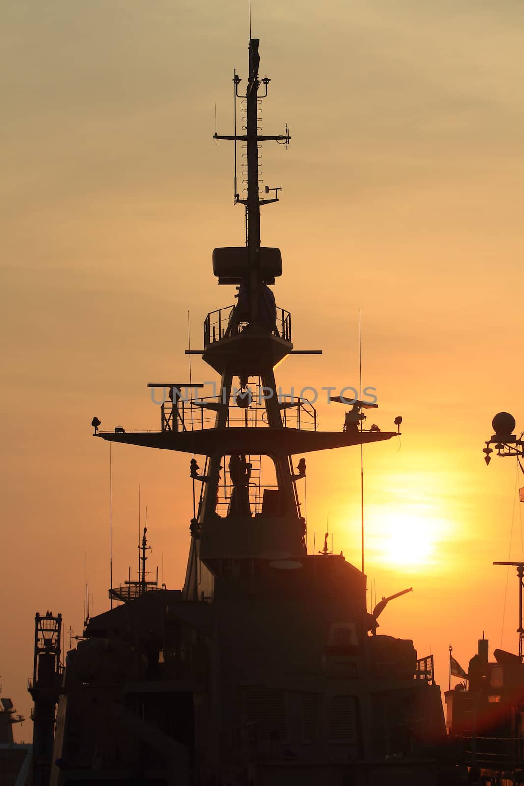 battleship with sunset behind