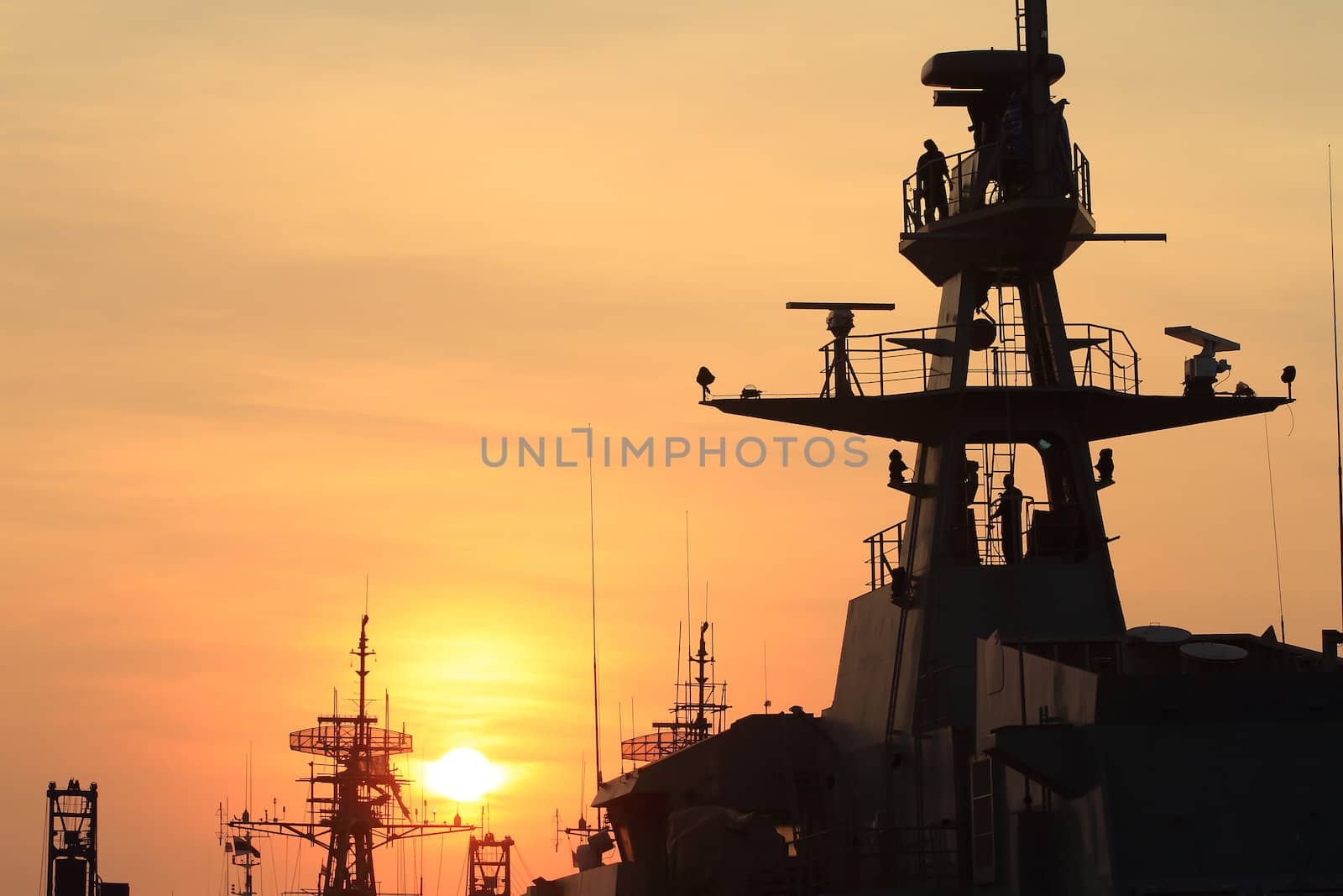 battleship with sunset behind