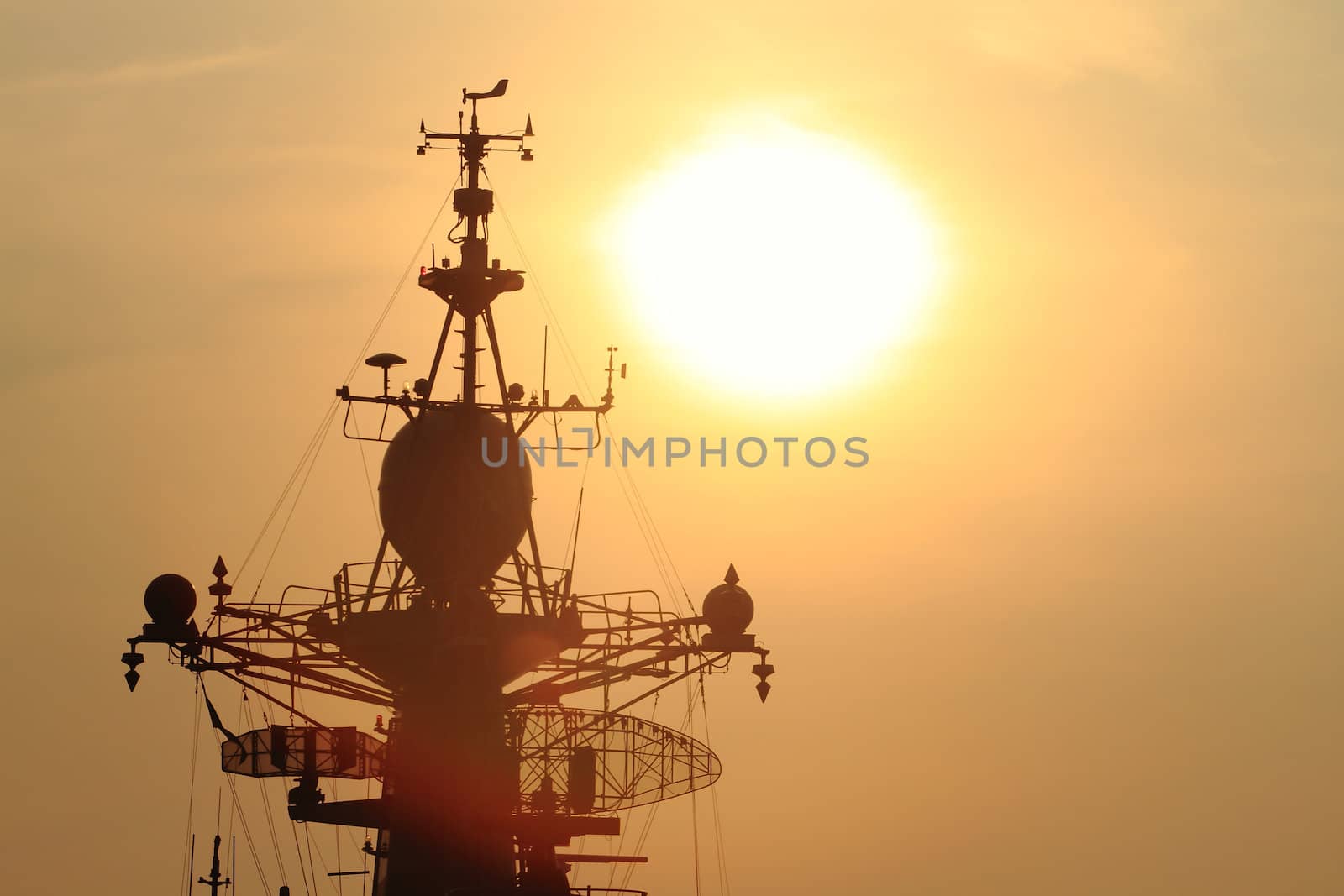 battleship with sunset behind