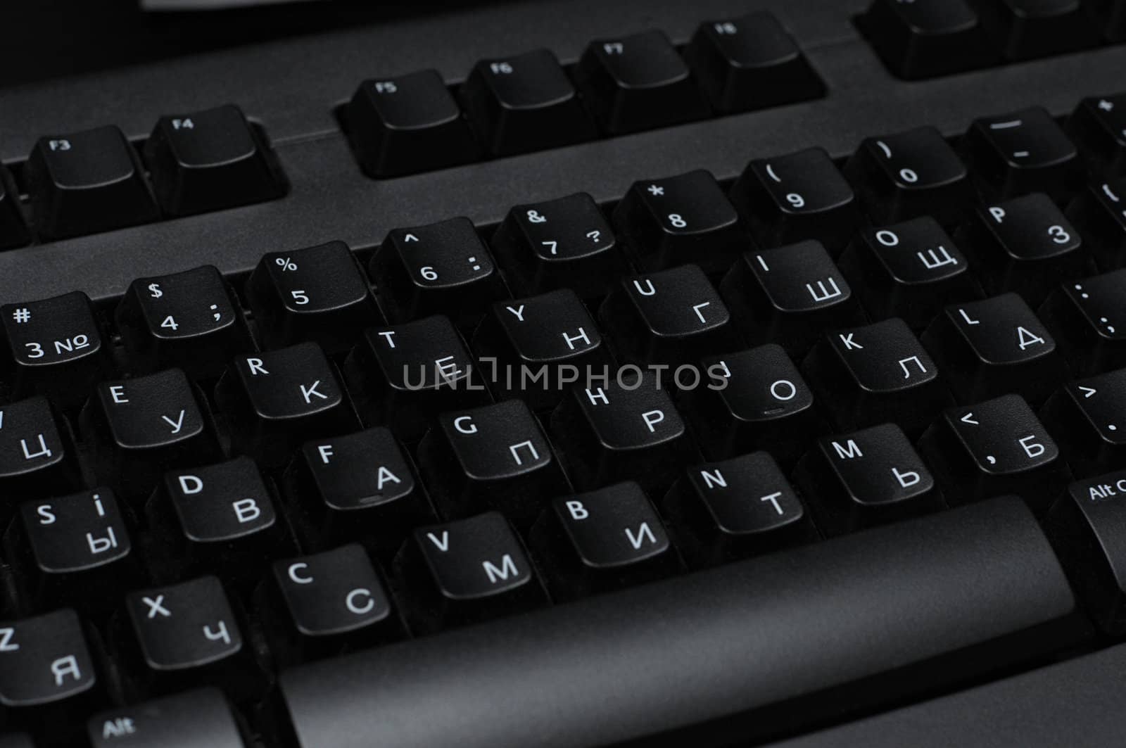 PC keyboard of black color close up view