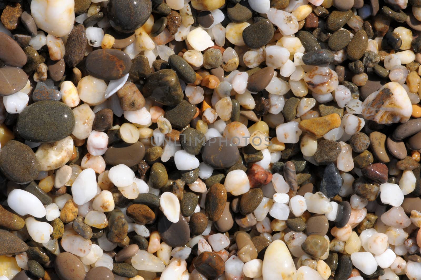 background made of a closeup of a pile of pebbles